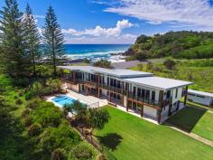 1 Rocky Point Rd Lennox Head NSW 2478 This trophy sits centre on the mantle of Boulders Beach exclusively with no neighbours. The view reaches to Byron Lighthouse north over beaches and headlands spilling along the coast from Lennox Head. Built to the highest standards over two levels there are five bedrooms four bathrooms and a three car garage with internal lift. Generous entertaining and living areas will easily accommodate large families and guests making it easy to co-exist either indoors or out. The kitchen stands centre and is well appointed looking over the salt water pool and beyond. The boundary is secured by a remote gate and fencing hidden by established native gardens that shield a cricket pitch lawn and yoga sanctuary.