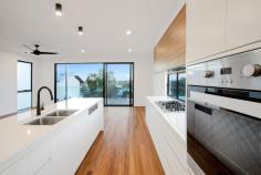9-11 MARJORIE STREET MOOLOOLABA QLD 4557 $1,225,000 Luxurious Mooloolaba Beach Homes Located in the heart of one of the country's most desireable and fastest growing regions to live the Sunshine Coast- Trinity Beach Homes at Mooloolaba present an incomparable opportunity to the astute purchaser. Built in synergy with the natural fall of the land each 3 Bedroom beach home offers an abundance of space, thoughtfully designed across multiple levels. From the warm hues of the timber floors, a neutral interior palette, a wealth of natural light, high ceilings and the efficient use of cross ventilation to capture cooling sea breezes and the soothing sounds of the ocean, each home has been designed for year round comfort and sophisticated relaxed living. •Large entertaining decks with seamless integration - providing a haven where you can soak up the views and cooling breezes •Private courtyard with the option of a pool •Connoisseurs will appreciate the quality Miele appliances in the gourmet kitchen. Incorporating a large walk in butlers pantry with stone benchtops throughout •Light filled open plan kitchen and dining •Spacious separate lounge •Master suite with WIR and double vanity ensuite •Study nook •Laundry Chute •High quality fixtures, fittings and finishes throughout •Spit system air-conditioning to living and bedrooms •2 car garage with room for storage With two beach home designs available this collection of elevated spacious multilevel homes has been thoughtfully designed to capture the cooling sea breezes and views. Just a short stroll away from Mooloolaba and Alexandra Headland beaches, walk to esplanade cafes, restaurants, bars and shopping. An envied location with all its convenient lifestyle offerings and the peace, space an privacy of your very own freestanding beach home.