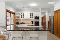 96 Bundara Park Dr Tuckombil NSW 2477 $1,550,000 Grand in proportions & large in size - this home is perfect for large or blended families - all wanting their own space to grow & stretch on this elevated two and a half acre private estate! At the end of a picturesque country cul-de-sac & on top of the plateau is this property - both inviting & impressive in an endearing way. Capturing views & sunsets to the west, this large modern home is accessed by a fully sealed driveway meandering through estate like grounds, ensuring a welcoming & impressive entrance. Positioned in the centre of the home are multiple living areas with fretwork & bay windows & a modern country kitchen with granite benchtops continuing the farmhouse theme. The oversized master suite is located at one end of the home, with ensuite & walk in robe whilst the three double bedrooms are located along with the guest bedroom & family bathroom for independence to the other end of the home. With almost all rooms flowing through French doors to return verandas - there is space for everyone to while away the summer days, entertain by the pool, meditate in the bale or soak up the winter sun. Expansive paved areas perfect for lazy barbeques adjoin the area at the rear which leads to the inground pool & also provides access to the spacious garage. With a bathroom & loft for additional guests, teenagers or home office this space is ideal for those working from home or convert to a studio (STCA). In what is an extremely convenient dress circle location with buses at door & only a short 10 minute drive to Alstonville for shops & services & less than 20 minutes to the beaches of Lennox Head & Ballina airport.