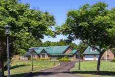 96 Bundara Park Dr Tuckombil NSW 2477 $1,550,000 Grand in proportions & large in size - this home is perfect for large or blended families - all wanting their own space to grow & stretch on this elevated two and a half acre private estate! At the end of a picturesque country cul-de-sac & on top of the plateau is this property - both inviting & impressive in an endearing way. Capturing views & sunsets to the west, this large modern home is accessed by a fully sealed driveway meandering through estate like grounds, ensuring a welcoming & impressive entrance. Positioned in the centre of the home are multiple living areas with fretwork & bay windows & a modern country kitchen with granite benchtops continuing the farmhouse theme. The oversized master suite is located at one end of the home, with ensuite & walk in robe whilst the three double bedrooms are located along with the guest bedroom & family bathroom for independence to the other end of the home. With almost all rooms flowing through French doors to return verandas - there is space for everyone to while away the summer days, entertain by the pool, meditate in the bale or soak up the winter sun. Expansive paved areas perfect for lazy barbeques adjoin the area at the rear which leads to the inground pool & also provides access to the spacious garage. With a bathroom & loft for additional guests, teenagers or home office this space is ideal for those working from home or convert to a studio (STCA). In what is an extremely convenient dress circle location with buses at door & only a short 10 minute drive to Alstonville for shops & services & less than 20 minutes to the beaches of Lennox Head & Ballina airport.