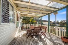 4208 Giinagay Way Urunga NSW 2455 $445,000 - $465,000 Positioned on an easy care 477m2 corner block this property is ideal for those wanting to downsize their yard work and upsize their lifestyle! Well presented throughout, the home is of good proportion offering: 3 bedrooms, a cosy lounge room plus a spacious open plan kitchen and dining area. Outside the rear entertaining deck faces north / east capturing both beautiful sun and cooling sea breezes, it's the perfect spot for a quiet morning cuppa or a raucous family BBQ. Car accommodation is really well catered for here, with a double lock up garage plus a high clearance single carport ideal for those with a motorhome, caravan or boat.