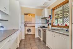 7 Alvaro Street Paralowie SA 5108 $285,000 This delightful brick home with a 1.5kw solar system (approx) is set on a generous allotment of approximately 677m2 in a no through street within easy reach of major shopping centres, walking distance to Paralowie R-12 School, reserves and public transport. The floor plan is quite substantial, comprising of a 3 good size bedrooms with built-in robes and ceiling fans, an L-shaped lounge/dining offering ample space for family living and serviced by a reverse cycle split system air conditioner and ceiling fan. The lovely updated kitchen has plenty of built-ins including pantry, stainless steel cooking appliances, gas cook top and dishwasher. The main bathroom has a full size bath, shower alcove, vanity and the convenience of a separate wc and laundry with rear yard access. The secure rear yard offers plenty of space for further additions (STCC), a large galvanised rumpus/utilities room, plus a second smaller garage/workshop and there is a full length verandah attached to the rear of the home to entertain family and friends. With interest rates so low, why not become a homeowner or landlord and reap the benefits for years to come.