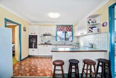 4208 Giinagay Way Urunga NSW 2455 $445,000 - $465,000 Positioned on an easy care 477m2 corner block this property is ideal for those wanting to downsize their yard work and upsize their lifestyle! Well presented throughout, the home is of good proportion offering: 3 bedrooms, a cosy lounge room plus a spacious open plan kitchen and dining area. Outside the rear entertaining deck faces north / east capturing both beautiful sun and cooling sea breezes, it's the perfect spot for a quiet morning cuppa or a raucous family BBQ. Car accommodation is really well catered for here, with a double lock up garage plus a high clearance single carport ideal for those with a motorhome, caravan or boat.