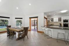 96 Bundara Park Dr Tuckombil NSW 2477 $1,550,000 Grand in proportions & large in size - this home is perfect for large or blended families - all wanting their own space to grow & stretch on this elevated two and a half acre private estate! At the end of a picturesque country cul-de-sac & on top of the plateau is this property - both inviting & impressive in an endearing way. Capturing views & sunsets to the west, this large modern home is accessed by a fully sealed driveway meandering through estate like grounds, ensuring a welcoming & impressive entrance. Positioned in the centre of the home are multiple living areas with fretwork & bay windows & a modern country kitchen with granite benchtops continuing the farmhouse theme. The oversized master suite is located at one end of the home, with ensuite & walk in robe whilst the three double bedrooms are located along with the guest bedroom & family bathroom for independence to the other end of the home. With almost all rooms flowing through French doors to return verandas - there is space for everyone to while away the summer days, entertain by the pool, meditate in the bale or soak up the winter sun. Expansive paved areas perfect for lazy barbeques adjoin the area at the rear which leads to the inground pool & also provides access to the spacious garage. With a bathroom & loft for additional guests, teenagers or home office this space is ideal for those working from home or convert to a studio (STCA). In what is an extremely convenient dress circle location with buses at door & only a short 10 minute drive to Alstonville for shops & services & less than 20 minutes to the beaches of Lennox Head & Ballina airport.