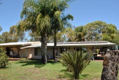 27 Todman Rd Coonabidgee WA 6503 Come and enjoy the fresh air..bore...and water tanks....6 Acres of Prime Land with excellent potential for Truck Storage Yard plus a 4 bedroom 2 bathroom residence with wrap around verandahs, two rev. cycle air conditioners, 20 solar panels, 5 water tanks holds 30,000gals. 1/4 of the property is auto reticulated with it's own bore 60x40 shed/workshop and the list goes on...... Located just off Brand Hwy. north of Muchea or Joondalup. In the shire of Gingin. Jusr 65km from Joondalup. This property is a very rare find in prime sort after area. This is a real find once the new Darwin Hwy. or North Link is completed making accessing the city much quicker and convenient, but still within easy proximity to shops etc.