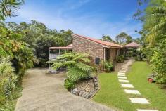 11 Sandpiper Place Aroona QLD 4551 $799,000 This is a stately brick residence on a large secluded block, offering room to move plus truck, boat, caravan storage if required. Good glimpses of the ocean and lush green landscaping provide the backdrop to comfortable, spacious living. This is the one that you have been waiting for to call home. This residence is only a 760 metre stroll to the Aroona local shopping centre . Consisting of: Four bedrooms, one of which is on the lower level and is complimented with a separate bathroom, this could be used as a separate living facility, this bedroom opens onto the lower balcony The upper level three bedrooms are all spacious with built in cupboards to the master, ensuite plus large his & her wardrobes, this bedroom opens onto a wide balcony. Design features high raked, timber ceilings with exposed beams in the living, kitchen and family rooms, which are all tiled. The rear balcony, which joins all living areas, is 2.9 metres wide x 21 metres in length. A covered deck at the main entry on the east elevation is complimented by a fully landscaped front garden. The kitchen offers abundant bench space and extensive storage. Air-conditioning in the main living area which is complemented by ceiling fans throughout Security screens throughout. Two lock up garages plus vehicle cover under the Southern deck. The property has an area of 311m2 plus a dry 80m2 storage area on the lower level. The block is completely fenced and landscaped.