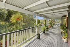 11 Sandpiper Place Aroona QLD 4551 $799,000 This is a stately brick residence on a large secluded block, offering room to move plus truck, boat, caravan storage if required. Good glimpses of the ocean and lush green landscaping provide the backdrop to comfortable, spacious living. This is the one that you have been waiting for to call home. This residence is only a 760 metre stroll to the Aroona local shopping centre . Consisting of: Four bedrooms, one of which is on the lower level and is complimented with a separate bathroom, this could be used as a separate living facility, this bedroom opens onto the lower balcony The upper level three bedrooms are all spacious with built in cupboards to the master, ensuite plus large his & her wardrobes, this bedroom opens onto a wide balcony. Design features high raked, timber ceilings with exposed beams in the living, kitchen and family rooms, which are all tiled. The rear balcony, which joins all living areas, is 2.9 metres wide x 21 metres in length. A covered deck at the main entry on the east elevation is complimented by a fully landscaped front garden. The kitchen offers abundant bench space and extensive storage. Air-conditioning in the main living area which is complemented by ceiling fans throughout Security screens throughout. Two lock up garages plus vehicle cover under the Southern deck. The property has an area of 311m2 plus a dry 80m2 storage area on the lower level. The block is completely fenced and landscaped.