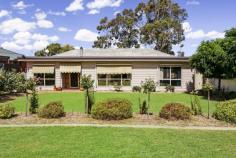 46 Kiniry Street Boort VIC 3537 $240,000 Gorgeous 3 bedroom family home with open-plan living, spacious interior with recent upgrades. Large kitchen with all electric appliances, including dishwasher. Separate dining area, with wood fire place. Split system air conditioning in each room, and tinted windows along the front and northern sides of the property. Outdoor blinds along front of house for added privacy. Large lounge room with near-new wool carpets. Three spacious carpeted bedrooms, main and second bedrooms with BIR, all with ceiling fans and split system air conditioning. Bathroom with triangle spa bath, separate shower, vynil floor and tastic. New bright laundry with W.C. adjoining. Linen cupboard in laundry and also in hallway. Outdoor entertaining area out the back, decking, ceiling fan, with outdoor kitchen including sink and bar fridge. Lawns and established gardens, with automatic sprinkler system in front garden and parts of back garden, Hills Hoist washing line. Rainwater tanks throughout the property, including 3 x 1,000L, 1 x 24,000L & 1 X 5,000L, along with pressure pump. Kitchen connected to rainwater. Electric HWS. Huge secure shed with concrete floor, power connected, and internal shelving along one side. Double-car space with roller doors, alongside 3 bay carport, currently used for play area. Chook shed at rear of property. Gravel driveway. Close to school, doctors and hospital.