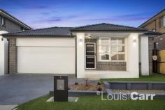 6 GOONGARRIE STREET KELLYVILLE NSW 2155 $950,000 - $995,000 Impeccably presented and stylishly finished, this 1 year young, single level home offers an intelligently designed floorplan, optimising effortless indoor/outdoor living with multiple formal & informal living areas and substantial accommodation. Framed by beautifully manicured level lawns it represents an outstanding lifestyle opportunity within a convenient locale within walking distance to buses, North Kellyville Square shopping precinct and future North Kellyville Public School. - Beautifully proportioned formal lounge room positioned at the front of the home. - Cook with ease in the stylish well-appointed gas kitchen with stone benchtops, breakfast bar, walk in pantry and quality stainless steel appliances. - Extensive multi-functional informal meals and family room area off the kitchen. - The oversized master suite enjoys a walk-in robe and chic, well-equipped ensuite, whilst the 3 other double bedrooms have built-in wardrobes. - Covered entertaining area ideal for alfresco dining complete with heat lamps and ceiling fan overlooking the sizeable rear level lawn and easy-care gardens. - Extra features include; plantation shutters, double garage with internal access, ducted reverse cycle air conditioning and security system. Local Amenities: - 1.4km to North Kellyville Public School (2019)/ 2.3km to Ironbark Ridge Public School - 2.3km to Rouse Hill High School - 200m to Barry Road Reserve - 700m to North Kellyville Square Shopping Centre - 3.8km to Rouse Hill Town Centre - 3.8km to Rouse Hill Station (2019) - 350m to buses on Barry Road.
