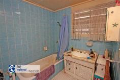 5 Bannerman Street Riverview QLD 4303 $225,000 This property would suit either an investor looking for a property with a tenant already in place; or, an owner occupier that is looking for an entry level property, with a few extras you do not often find in this price range. Yes, you can probably find some putty and paint work that needs doing; but, at this price the property represents great value. For the investor, the current tenant, who has been at the property for approximately 8 years, is on a periodic lease paying $225 per week. He has indicated that if the property is sold to an investor that he may be interested in staying on. For the Owner Occupier this property provides a great opportunity for a young family that would enjoy the benefits of the pool and the shed, things rarely seen in this price range. For those with young children the Local Primary & Pre School is at the end of the street, approximately a 500 m walk. At a Glance: - 3 bedrooms mid-set style home (4 steps through front door) - Brick Pier with cement sheet inlays under the windows construction - Concrete tile roof - Drive through Single Carport to a - Free standing Double Lock up Garage - In-ground pool - Property is on metered Town Gas - Solar Panel Array on roof - Instantaneous gas hot water system approximately 1 year old - Current tenant paying $225 per week, on a periodic lease has been at the property for approximately 8 years and has indicated may if possible stay on - Fully fenced 640 m2 approx. block Inside: - Timber floors throughout - Functional kitchen that overlooks the backyard and pool - Shower over the bath and separate toilet - Open plan living area with combustion stove - Separate laundry Location: - Approximately 1.9 km to the Redbank Plaza Shopping Centre * - Approximately 500 m to Riverview Primary & Pre School * - Approximately 1.4 km to St. Peter Claver College * - Great Access to Ipswich Road and the Logan, Cunningham & Warrego Highways