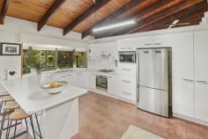 11 Sandpiper Place Aroona QLD 4551 $799,000 This is a stately brick residence on a large secluded block, offering room to move plus truck, boat, caravan storage if required. Good glimpses of the ocean and lush green landscaping provide the backdrop to comfortable, spacious living. This is the one that you have been waiting for to call home. This residence is only a 760 metre stroll to the Aroona local shopping centre . Consisting of: Four bedrooms, one of which is on the lower level and is complimented with a separate bathroom, this could be used as a separate living facility, this bedroom opens onto the lower balcony The upper level three bedrooms are all spacious with built in cupboards to the master, ensuite plus large his & her wardrobes, this bedroom opens onto a wide balcony. Design features high raked, timber ceilings with exposed beams in the living, kitchen and family rooms, which are all tiled. The rear balcony, which joins all living areas, is 2.9 metres wide x 21 metres in length. A covered deck at the main entry on the east elevation is complimented by a fully landscaped front garden. The kitchen offers abundant bench space and extensive storage. Air-conditioning in the main living area which is complemented by ceiling fans throughout Security screens throughout. Two lock up garages plus vehicle cover under the Southern deck. The property has an area of 311m2 plus a dry 80m2 storage area on the lower level. The block is completely fenced and landscaped.