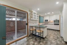 65 SHEPPARD ROAD EMU PLAINS NSW 2750 $739,000 - $779,000 Positioned in one of Emu Plains most sought after locations within only a short walk to the Nepean River, Emu Plains train station, Lennox Shopping Centre and local schools, this 5 bedroom home offers a great opportunity. With a spacious undercover entertaining area overlooking the spacious backyard and sparkling in-ground pool. > 5 Bedrooms plus study, ensuite and walk in robe to main > Large lounge and separate sunken dining area > Great sized kitchen with separate meals area > Plantations shutters, polished floor boards and air conditioning > Tandem lock up garage plus carport + in-ground swimming pool