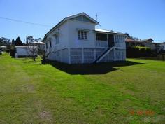 17 Coronation Drive Boonah QLD 4310 $285,000 Queenslander featuring -3 bedrooms + sleepout -Good size kitchen with adjoining dining room -Separate lounge -Polished floors & carpet -1 bathroom -Downstairs laundry and second toilet -Front verandah -Single garage -FULLY fenced backyard -Walk to town/Schools