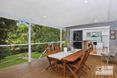 20 Janet Ave Thornleigh NSW 2120 $1,280,000 to $1,350,000 The combination of a versatile floorplan, a contemporary renovation and extension plus a spectacular outlook create this home with a DIFFERENCE. A winning location too . . .nestled in a quiet, leafy pocket yet just a convenient 5 min. walk to the train station and shops. Charming features greet your inspection: a tiled front porch overlooking the established, private garden, polished timber floors throughout, high 2.7m ceilings with skylights to capture natural light, r.c air- conditioners and bespoke glass feature windows. Designed with family in mind the open- plan living and dining flow directly to the modern kitchen with Caesarstone benches, chef's oven, pantry, dishwasher and a high set leafy outlook. Particularly spacious bedrooms with built-in robes and ceiling fans, the main bedroom features built-in cabinetry and robes, modern ensuite, ceiling fan plus air-conditioning. And WOW, the new main bathroom in vogue style is designed for comfort and convenience, complete with skylights, designer lighting and recessed niches designed for the shower and over the luxurious stone bath. A BONUS room is the particularly generous 4th room, with versatility as a bedroom or that extra TV room, teenage retreat or study, leading through double French doors to the lovely rear deck and view. A fabulous alfresco entertaining deck flows seamlessly from the living space, set beneath the main roof allowing year-round outdoor living, dining and relaxation. Complete with an in-built BBQ and fridge cabinet connected to mains gas, the high set aspect of this deck offers an impressive view; a tranquil leafy outlook plus privacy. The designated home office downstairs benefits from its own separate access, ideal for the home workspace AND . . .the home handy person, hobbyist or tradie will be amazed at the full under- house storage and workshop space with power, lights, work bench and standing height. The landscaped rear yard features level, sandstone- terraced lawns, complete with feature lighting and a fountain, securely fully fenced and just perfect playing or gardening. Some of the extra features in this home include: camera monitored security system, gas cooking, gas hot water and gas heating, an internal air extractor system to assist with climate control, huge water tank for the garden and auto-garage door plus ample space to park a trailer, van or extra vehicles. Convenience plus . . . with Sydney Adventist Hospital, National Park, bush- walking tracks, M1 and M2 access and an impressive list of sought-after schools all within easy access from this property. Set on a 734m2 block, this MODERN home is a refreshing opportunity, don't miss this inspection.