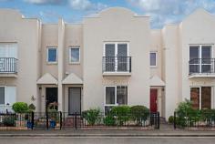 12 Davies Street Port Melbourne VIC 3207 $1,300,000 - $1,400,000 Tucked away in a blissfully quiet cul-de-sac, moments from the buzz of Bay Street, this two-level townhouse presents an outstanding city-edge lifestyle or investment opportunity with its generous floorplan, delightful backyard oasis and abundance of natural light throughout. Beyond the attractive rendered facade, discover a free-flowing design highlighting three bedrooms (large master with WIR), ensuite, main bathroom and laundry/guest WC. Add to this a spacious front lounge leading through to the sunny dining area complete with floor-to-ceiling windows and adjoining kitchen with dishwasher. Other features of the home include ducted heating throughout, alarm system, front balcony, plus a surprisingly large back garden with northerly aspect and high fences for added privacy along with a secure carport via Norma Bennett Lane behind. Walking distance to the area's cool cafes and renowned restaurants, shops and supermarkets, it's also close to local buses, North Port Station (light rail) as well as schools, parks and the beach. Lifestyle and location - what an opportunity!