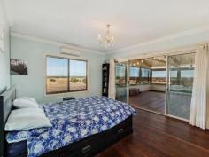 1568 GREAT NORTHERN HIGHWAY UPPER SWAN WA 6069 $1,760,000 A stunning 58 acre rural property just 45 minutes or approximately 33 kms from the Perth GPO. Nestled high up on the escarpment this custom built farmhouse has large open plan living areas and 2 expansive deck areas all taking in the uninterrupted views over the Swan coastal plains from Bullsbrook to the city. There are 5 double bedrooms, 2 bathrooms, an upstairs office and a separate activity/media area for the children. 4 bedrooms have bi robes and the master bedroom has a walk through dressing room to the ensuite with a spa bath. Extras include a 3 bay carport under the main roof, a farm size laundry, reverse cycle air conditioning, a slow combustion wood heater, solar power connection with 2 x 2.5 kilowatt inverters and mains water access. The farmhouse overlooks 5 fenced paddocks with a dam and windmill providing water to each paddock. There is also a 5,700 kilolitre water licence that remains as part of the sale of this property.