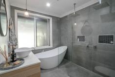 6 Murray Street Eleebana NSW 2282 $655,000 - $695,000 This sensational family home with northerly aspect has been totally refurbished with all the modern comforts that you deserve. If you think it looks great on the outside, you will be blown away on what's inside. From the formal entry right through to the extra-large alfresco entertainment area nothing has been spared. Floating timber floors and air-conditioned comfort in the living areas, soft quality carpets in the three bedrooms and the multi-purposed room downstairs plus modern shutters and venetians. Well there are kitchens and then there are kitchens. This one steals the show with a generous island bench, stainless steel appliances, soft close cupboards and draws and is the focal point of the home. It has easy access to the extra-large alfresco for fun with friends and a casual dining for family dinners. If that's not enough the vogue bathroom looks like its straight out of a glossy magazine and will blow your socks off. Nestled on a near level kid-safe block it's the perfect spot to raise a family. Great garaging for three cars or even that boat you've always wanted as its only 600m to the boat ramp.