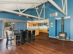 1568 GREAT NORTHERN HIGHWAY UPPER SWAN WA 6069 $1,760,000 A stunning 58 acre rural property just 45 minutes or approximately 33 kms from the Perth GPO. Nestled high up on the escarpment this custom built farmhouse has large open plan living areas and 2 expansive deck areas all taking in the uninterrupted views over the Swan coastal plains from Bullsbrook to the city. There are 5 double bedrooms, 2 bathrooms, an upstairs office and a separate activity/media area for the children. 4 bedrooms have bi robes and the master bedroom has a walk through dressing room to the ensuite with a spa bath. Extras include a 3 bay carport under the main roof, a farm size laundry, reverse cycle air conditioning, a slow combustion wood heater, solar power connection with 2 x 2.5 kilowatt inverters and mains water access. The farmhouse overlooks 5 fenced paddocks with a dam and windmill providing water to each paddock. There is also a 5,700 kilolitre water licence that remains as part of the sale of this property.
