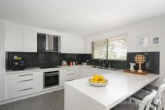 46 Barr-Smith Drive Urrbrae SA 5064 $825k - $875k This beautiful home is ideally located in the ever popular suburb Urrbrae. At the entrance to the Adelaide Hills and just minutes from the popular Mitcham Shopping Centre and the cosmopolitan Burnside Village, sought after schooling and a short 15 min drive to the CBD. The home offers ample family accommodation with 4 bedrooms, multiple living spaces enjoying the fantastic views, updated kitchen and bathrooms and ample parking. Zoned for Highgate Primary School and Unley High School. Also centrally located to a range of quality private schooling options. Further features of this home include: -4 bedrooms, main with ensuite bathroom and walk in robe -Spacious sitting and dining room with amazing views across the city -Updated kitchen overlooking a second living area -Updated main bathroom with additional WC -Ducted reverse cycle air-conditioning -Outdoor entertaining area -Solar panels -Large double garage with attached workshop -Established garden with automatic watering system.