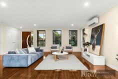 1/4 MOUNTAIN ASH AVENUE ASHWOOD VIC 3147 A brand new street-front town residence has become available in Ashwood showcasing luxurious proportions, sublime finishes and exceptional functionality. Encompassing elements and carefully considered details, this residence provides a unique dual zoned layout flowing from a light-filled lounge, a spacious open plan living/dining zone and high-end galley-style kitchen boasting stone surfaces, Bosch appliances and walk-in pantry. Enjoy the versatility of ground floor and first floor main bedrooms, each with a designer ensuite, complemented by 2 further robed bedrooms, teenage retreat and stylish fully-tiled bathroom. Split system heating/AC, powder room, alarm system, video intercom, timber floors, entertaining courtyard and double garage are amongst the additional assets of a home certain to establish a new benchmark. Located for lifestyle convenience, close to Ashwood College, Parkhill Primary, Gardiners Creek parkland, Ashburton Village, Chadstone Shopping Centre and transport.