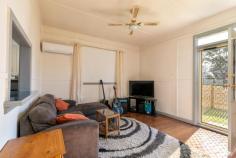 8A Garth Street Edgeworth NSW 2285 $330,000-$360,000 Situated in a quiet street, surrounded by many homes that have been renovated and/or extended, along with some newer property, is this affordable home. It offers an opportunity for a young person/couple to enter the market and value add or perhaps the astute investor might be drawn to the weekly return of $330 per week from a quality tenant who'd appreciate the opportunity to stay on. - Good street, affordable home needing some external TLC - Neat and tidy interior, move in and enjoy straight away - Two bedrooms including an oversized main bedroom - Generously proportioned kitchen and an updated bathroom - Air conditioned lounge upon entry, beautiful timber floors - Area for second tv as well as study desk option to rear of the home - Covered outdoor area overlooking easy care yard with lawnlocker - Off street parking with scope to put a carport if desired (subject to approvals) - Tenant on expired lease paying $330per week, wanting to stay on - Vacant possession available for home buyers wanting to move in Edgeworth is a quality suburb with its own shopping centre and only a few minutes drive to Stockland Glendale. It has various entertainment options with a pub and clubs, parkland, good schools and the M1 and Hunter Expressway provides easy access to the South Coast, Sydney and the Hunter. For those on a budget, this home truly presents an opportunity that needs to be viewed and seriously considered. Why rent when you can purchase this little cracker! Inspections commence this Saturday!