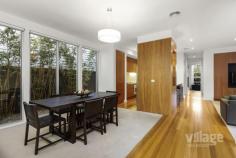 8 OBERON WAY NEWPORT VIC 3015 $1,400,000 - $1,450,000 Certain to take your breath away, this contemporary yet timeless, 3 bedroom residence has been architect-designed for a lofty, light-loving, sense of spaciousness unlike most others. A brilliant use of windows, natural light and towering ceilings creates a visual impact that will always endure. _The kitchen is central to open-plan meals / living with broad corian benches, a breakfast bar and a Gaggenau stainless steel oven / cooktop. _A divine flow through two sets of glass sliding doors to a north-facing courtyard with a retractable awning is perfectly suited to al fresco entertaining. _Combining towering ceilings with the remarkable ambiance of a Heat’n’Glo gas log fire, the sunken lounge room is stunning. _The master bedroom is a vast indulgence with a designer ensuite and wonderful walk-in robes. _Also vogue, the bathroom is family-sized with independent bath and a frameless-screened shower. _The remaining two bedrooms are well-appointed with large built-in robes. _Double garage with polished concrete floors. _Ducted gas heating and refrigerated air conditioning. _Also features polished timber floors, ducted vacuum and an alarm. _Quiet setting near cafes, shops and schools. _Walk to parkland and the waterfront. _Easy city access by train in under 15 minutes.