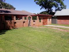 3 Cook Street Muswellbrook NSW 2333 $305,000- The Balance is right with this Full Brick home set in the heart of town but enjoying a great deal of Privacy. A 3 B/r Home with a plantation front fence and gorgeous sunny front court yard. All this in behind custom timber gates. The house has some stand alone features and it's well insulated with double brick & Tile. There's a foyer entrance, Lounge room (Split Air Cond & Wood Fire) Dining/meals area, Kitchen, tiled bathroom plus ensuite bathroom to the main Bedroom. Walk in robes are handy to the main, and BIW's are in the 2nd bedroom. There's glossy stone bench tops in the kitchen with a Wall Oven, Bench Cook Tops plus a Dishwasher. The glass splash back look great and you'll love the glossy timber floor finish. The house is set with two split air conditioners and sliding glass doors front and back let the place breath. So close to everywhere, it's just a stroll to shops, schools and sporting fields.