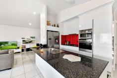 31 Tribeca Circuit North Lakes QLD 4509 ACT NOW and make an offer to secure this stylish modern home! Seller requires IMMEDIATE sale - All offers must be submitted for consideration prior to sale deadline:- 5pm, 15th April, 2019. Contact Darren Suhle for Terms of Sale. Situated opposite a large park, in a superbly convenient location in Mode estate, this appealing air-conditioned 3 bedroom home provides an enticing lifestyle opportunity afforded its position, seamlessly combined with comfort and practicality. Just a short stroll to the very heart of North Lakes where you'll find shops, restaurants, cinema, schools, public transport and a vast array of other fabulous amenities that this fast growing master planned community has to offer, right there for your convenience. Comprising:- -Master Bedroom with ensuite and walk in robe - master has plantation shutters through to living zone - providing either a delightful open perspective to the bedroom or an alternate level of privacy, depending on your personal preference -2 additional bedrooms - each with built in robes and ceiling fans -Bedroom 2 also features a balcony overlooking park -Separate upstairs study -Modern kitchen overlooking dining area features stone benchtops, gas cooktop, wall oven, -Large fridge cavity for double door fridge- fisher paykel dishwasher and a large walk in pantry -Open plan dining and living area is airconditioned and boasts a raked ceiling that enhances the feeling of spaciousness -Separate upstairs living / family room -Main bathroom with stone benchtops and large shower -Downstairs powder-room -Solar -Air-conditioning -Low maintenance yard with patio/pergola -Double garage.