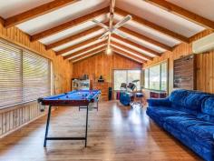 117 High Street Wallalong NSW 2320 $550,000 - $585,000 Set amongst a lush garden oasis brimming with hardy grasses and succulents, towering palms and manicured lawns, this large family home is one of a kind. Packed with charm and rustic ambience, the four-bedroom brick home combines a unique combination of warm country atmosphere with contemporary features. Framed by tall, established trees, the home is on a 1614sqm block with a quaint front porch, with pebblecrete flooring, creating a welcoming and cosy atmosphere in which to arrive at the property. Entry is directly into the spacious living area, which is brimming with country charm. Contemporary polished floorboards create a stunning first impression and combine beautifully with exposed brick feature walls and a slow combustion fire that’s ideal for chilly winter days spent warm and toasty indoors. The flooring merges to carpet in the sitting area of the living room and this offers both extra comfort and a modern edge to the decor, which marries beautifully with the natural light flooding in the large picture window. Soaring raked ceilings are a stunning feature of this home and they shine in the open-plan kitchen and dining room, where today’s appliances combine with slate-look flooring and timber cabinetry to create a practical yet eye-catching cooking and meals area. The kitchen has a 900mm, stainless steel Smeg oven, large pantry and lots of bench and cupboard space while French doors open off the dining area to the peaceful outdoor entertaining area. A natural pergola, exposed timber is covered with lush foliage to create a shady, cool entertaining area with a built-in barbeque. There is also an enclosed entertaining room with concrete flooring and access to a covered deck for entertaining and upstairs awaits a wonderful loft. Boasting timber floorboards and wall panelling, the loft has soaring raked ceilings and lots of natural light flooding in the series of large windows. The space is ideal for those that work from home or as a teenager’s retreat, with a split system air conditioner keeping the temperature perfect in every season. In the hot summer months you can also enjoy a dip in the inground pool, which is surrounded by lush gardens and is very private. Four generous bedrooms, all with built-in robes, await, with the master suite also boasting an ensuite and the other rooms sharing the family bathroom with its bath and separate, open shower with detachable shower head. Other features of this stunning property include a double garage with drive through access, a chicken coop and garden shed. All of this is just a 15-minute drive from all Maitland has to offer, including excellent schools, medical facilities and shopping. SMS 117High to 0428 166 755 for a link to the on-line property brochure. Kitchen Rumpus Room Built In Robes Verandah Floorboards High Ceilings Air Conditioning Dishwasher Pet Friendly Courtyard Outdoor Entertaining Area Fully Fenced In Ground Swimming Pool Electric Hot Water.