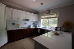 Villa 1/20 Kangaloon Rd Bowral NSW 2576 $895,000 - $950,000 LIGHT AND BRIGHT, THIS HOME OFFERS A RELAXING AND WELCOMING AMBIENCE ALONG WITH CLOSE PROXIMINITY TO TOWN * 3 generous bedrooms - all with plantation shutters * Built-in robes * 2 bathrooms - ensuite to main * Combined formal lounge and dining with garden vistas and plantation shutters * Well appointed timber kitchen with electric appliances, dishwasher, pantry, breakfast bar and stone benchtops * Family room / casual meals area (tiled) with plantation shutters and sliding doors to rear sunny, paved, outdoor entertaining area * Ducted gas central heating * 9ft ceilings * Acoustic laminated windows * Ducted vacuum system * Galley laundry with storage, benchspace and door to outside * Double garage with auto doors, roof loft for storage and internal access * Landsize: 712m2 SITUATED AT THE END OF A PRIVATE NO THROUGH ROAD OPPOSITE BOWRAL GOLF CLUB IT IS IN A COMPLEX OF SEVEN EXECUTIVE HOME WHICH ARE ALL FREESTANDING AND ON TORRENS TITLE NO STRATA FEES A TEN MINUTE WALK TO THE CENTRE OF TOWN AND CLOSE TO HOSPITALS, PARKS AND THE TRAIN STATION