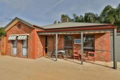 2/71 Thirteenth Street Mildura VIC 3500 $180,000 - $198,000 Located just a leisurely stroll to your morning coffee and newspaper at Cappy's Corner Store, this neat and tidy two bedroom home set on 253m2 is the low maintenance oasis you've been searching for. Perfect for those seeking easy-care living or the astute investor wanting a savvy addition to their property portfolio. The master bedroom features a walk in robe, and the guest room a built-in robe, both with air-conditioning and access to the main bathroom with bath and separate toilet. The kitchen offers ample bench and storage space, overlooking the tranquil undercover concrete outdoor area that will be perfect for entertaining friends and family year round. A double garage with plenty of room for the your tools and side lane access round out this great property. The brick veneer unit enjoys a peaceful, private and secure position at the rear of the complex.