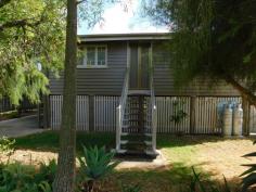 3 Madden Lane Rosewood QLD 4340 $265,000 Located in a quiet no through street in Rosewood, this sturdy timber home makes the perfect pad for the young family. There are three good sized bedrooms, a front sunroom that can be utilised as a study or sitting room or even opened back up to make a front verandah. The eat in kitchen is large and features a stainless steel dishwasher (for the renovator at heart there is more than enough room to fit the largest of kitchens into this space). Adjacent to the kitchen is the separate lounge that has A/C. The bathroom has the shower over a small bath. Other features include timber floors throughout, French doors and high ceilings. The exterior of the home has been recently painted so no work needed there! The yard is level and with full fencing at the rear making it a safe place for the kids and pets. Underneath the house is the laundry and fully concreted therefore offering loads of room for storage. There is vehicle side access to the rear of the yard for those that may want to build a shed in the future. For the cars, there is a tandem carport at the front as well as a single carport on the opposite side of the property. The Rosewood public state school is located at the end of the street and it is an easy walk to High School, town centre and railway station.
