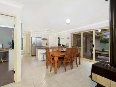 23 Jessica Close Raymond Terrace NSW 2324 $440,000 - $460,000 Ideally located between Maitland and Newcastle, this Raymond Terrace home is perfect for families who love to entertain. On hot summer days you can cool off in the saltwater, inground pool before reclining on the surrounding decking to enjoy a cool drink and a good book. There are also two covered, alfresco entertaining areas suitable for all occasions. The cosy entertaining area located directly off the dining area is ideal for those easy summer barbecues on a balmy night. At the rear of the home awaits a large, covered entertaining area that will cater for many guests should you wish to hold a celebration, party or just have the extended family on the weekend. Inside the brick and tiled roof home awaits a spacious family abode with two living areas, four bedrooms and a home office. It’s perfect for growing families and those who desire a work-from-home option, with the former single garage converted into a comfortable office and separate bedroom. The heart of the home is the centrally located kitchen, which is flanked by the dining area on one side and the large living room on the other. It’s a smart floor plan that allows each area to be used individually, without ever feeling closed off from the rest of the home. The kitchen features long laminate benches, lots of cupboard space, a large pantry and stainless steel appliances. It overlooks the tiled dining area, where a slow combustion wood heater works to keep you warm and adds a warm, relaxing atmosphere to the home. The living room is also sure to impress with its generous proportions, large picture windows on either side which make it lovely and light and split-system air conditioning for comfort all year round. The master suite lies at the front of the home and features a box bay window, that would work beautifully as a reading corner, while a mirrored triple door built-in robe provides plenty of storage and an ensuite offering an oversized shower. There’s also a split-system air conditioner in the master bedroom. Two of the three remaining bedrooms have built-in robes, while the third, which is attached to the home office, would be great for a teenager or extended family member should you wish to use the office as a retreat or chillout space. The family bathroom has a separate shower and bath, large vanity and strip wall heater. The property is located within walking distance of the beautiful Grahamstown Lake, which has a boat ramp, while other nearby amenities include Grahamstown Public School, parks and local shopping. Raymond Terrace is about a 30 minute drive from Maitland and a 35 minute drive from Newcastle, giving you the option of working in the city but living in the country with an easy commute. SMS 23Jess to 0428 166 755 for a link to the on-line property brochure. Kitchen Walk In Pantry Built In Robes Air Conditioning Pay TV Cable/Sat Dishwasher Pet Friendly Outdoor Entertaining Area Shed Fully Fenced Decking In Ground Swimming Pool Solar Panels Gas Hot Water.