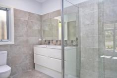 37 Fisken St Ballan VIC 3342 $650,000 NOW $595,000 This beautiful 3 bedroom sophisticated home is designed for easy living. Brand new and sitting pretty this first class property offers: -3 good sized bedroom . -Master with ensuite and walk in robe. -Luxurious bathroom with double vanity. -Extensive open plan living. -Modern contemporary style kitchen with butlers pantry. -Spacious laundry with walk in linen cupboard. -9ft ceilings. -Central heating/split system cooling. -6* energy rating. -Double remote garage. -Paved courtyard garden area a blank canvas ready for you design and plant. -Water tank. -Watering system for front lawn and hedges. -7 year builders warranty.