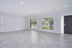 37 Fisken St Ballan VIC 3342 $650,000 NOW $595,000 This beautiful 3 bedroom sophisticated home is designed for easy living. Brand new and sitting pretty this first class property offers: -3 good sized bedroom . -Master with ensuite and walk in robe. -Luxurious bathroom with double vanity. -Extensive open plan living. -Modern contemporary style kitchen with butlers pantry. -Spacious laundry with walk in linen cupboard. -9ft ceilings. -Central heating/split system cooling. -6* energy rating. -Double remote garage. -Paved courtyard garden area a blank canvas ready for you design and plant. -Water tank. -Watering system for front lawn and hedges. -7 year builders warranty.