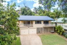 14 Palmway Cl, Woombye QLD 4559 $400,000 Peaceful, private and ready to be yours, this one owner home is located right near the end of the well regarded Palmway Close Woombye. Very central and conveniently located, just about everything you need is within 5 minutes from home - shopping centres, schools, transport, services. Featuring quality polished timber floors right through the house and 2 separate living areas - each with its own connecting verandah, the house is spacious and inviting. The two front verandahs are wonderful spots to enjoy a sunny breakfast on the deck or just relax in the afternoon with a cooling beverage. Every room offers a lovely natural forest or green garden outlook, with the views from the front directly to a panorama of green vegetation - a very calming view to enjoy everyday. A large, well equipped central kitchen and dining area, with the main bedroom at one end of the home offering good separation from the other two bedrooms. Split system air conditioning throughout the home ensures cool comfort in the summer. Downstairs in this pole home design is a double lock up garage and storage area. This area could also be further dug out to easily create another room or two or a Granny Flat if desirable. The block size is 752 square metres, plenty of room in the backyard for vegie gardens and to plant fruit trees if you wish. It has been a wonderful family home for the past 15 years to the current owner - here's your chance to 'get into the market' and make it your own. Inspections are most welcome - please contact Kirk Patrick at Riddell Real Estate Woombye.