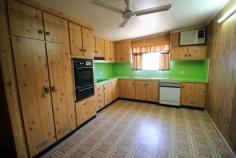 64 Seventeenth St Home Hill QLD 4806 $165,000 When it comes to pleasing the whole family this very well kept family home on a fenced 1012m2 lush town block located in one of Home Hill's quiet streets with only minutes to the CBD and all this country town has to offer... Bragging 3 very generous air conditioned bedrooms, generous air conditioned living and dining area with a family sized kitchen with loads of bench, prep and storage space... huge bathroom with both shower and tub, linen storage and separate toilet. It keeps getting better... A most sizeable family/rumpus room, carpeted and air conditioned will be enjoyed by all and is conveniently located near a second shower and toilet, internal laundry with heaps of storage and so much more... Back undercover bbq/ent area to enjoy making memories with family and friends... Garden shed and an established veggie patch underway... Parking is no issue with space available fro 3/4 plus handy worksop area for the man of the house... It's all here with this one and is awaiting it's "new family" to make her a home again... Hurry and call today!