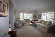 Villa 1/20 Kangaloon Rd Bowral NSW 2576 $895,000 - $950,000 LIGHT AND BRIGHT, THIS HOME OFFERS A RELAXING AND WELCOMING AMBIENCE ALONG WITH CLOSE PROXIMINITY TO TOWN * 3 generous bedrooms - all with plantation shutters * Built-in robes * 2 bathrooms - ensuite to main * Combined formal lounge and dining with garden vistas and plantation shutters * Well appointed timber kitchen with electric appliances, dishwasher, pantry, breakfast bar and stone benchtops * Family room / casual meals area (tiled) with plantation shutters and sliding doors to rear sunny, paved, outdoor entertaining area * Ducted gas central heating * 9ft ceilings * Acoustic laminated windows * Ducted vacuum system * Galley laundry with storage, benchspace and door to outside * Double garage with auto doors, roof loft for storage and internal access * Landsize: 712m2 SITUATED AT THE END OF A PRIVATE NO THROUGH ROAD OPPOSITE BOWRAL GOLF CLUB IT IS IN A COMPLEX OF SEVEN EXECUTIVE HOME WHICH ARE ALL FREESTANDING AND ON TORRENS TITLE NO STRATA FEES A TEN MINUTE WALK TO THE CENTRE OF TOWN AND CLOSE TO HOSPITALS, PARKS AND THE TRAIN STATION