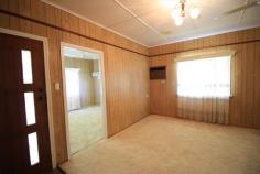64 Seventeenth St Home Hill QLD 4806 $165,000 When it comes to pleasing the whole family this very well kept family home on a fenced 1012m2 lush town block located in one of Home Hill's quiet streets with only minutes to the CBD and all this country town has to offer... Bragging 3 very generous air conditioned bedrooms, generous air conditioned living and dining area with a family sized kitchen with loads of bench, prep and storage space... huge bathroom with both shower and tub, linen storage and separate toilet. It keeps getting better... A most sizeable family/rumpus room, carpeted and air conditioned will be enjoyed by all and is conveniently located near a second shower and toilet, internal laundry with heaps of storage and so much more... Back undercover bbq/ent area to enjoy making memories with family and friends... Garden shed and an established veggie patch underway... Parking is no issue with space available fro 3/4 plus handy worksop area for the man of the house... It's all here with this one and is awaiting it's "new family" to make her a home again... Hurry and call today!