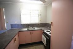 22 Topton St Alva QLD 4807 $170,000 A lucky family is one step closer to owning their own 'weekender' down at beautiful Alva Beach... Soak up the great atmosphere and lifestyle of beach living with this high set 2 bedroom home... Lush 759m2 block with fenced backyard... Upstairs brags an open plan layout with ample living and dining, neat and tidy kitchen and internal laundry facilities and bathroom amenitites... 2 Godd sized bedrooms with main offering built ins and air conditioning and a very nioce upper verandah to soak up the sea air... Underneath is a generous enclosed room with a second shower and separate toilet, tiled and fanned and would be a perfect for visitors or exceptional to entertain... Carport parking is available for 2 with a sizeable rain water tank out back... Priced to sell so dont hesitate to arrange an inspection of this one today!!
