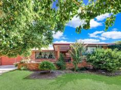  117 High Street Wallalong NSW 2320 $550,000 - $585,000 Set amongst a lush garden oasis brimming with hardy grasses and succulents, towering palms and manicured lawns, this large family home is one of a kind. Packed with charm and rustic ambience, the four-bedroom brick home combines a unique combination of warm country atmosphere with contemporary features. Framed by tall, established trees, the home is on a 1614sqm block with a quaint front porch, with pebblecrete flooring, creating a welcoming and cosy atmosphere in which to arrive at the property. Entry is directly into the spacious living area, which is brimming with country charm.  Contemporary polished floorboards create a stunning first impression and combine beautifully with exposed brick feature walls and a slow combustion fire that’s ideal for chilly winter days spent warm and toasty indoors. The flooring merges to carpet in the sitting area of the living room and this offers both extra comfort and a modern edge to the decor, which marries beautifully with the natural light flooding in the large picture window. Soaring raked ceilings are a stunning feature of this home and they shine in the open-plan kitchen and dining room, where today’s appliances combine with slate-look flooring and timber cabinetry to create a practical yet eye-catching cooking and meals area. The kitchen has a 900mm, stainless steel Smeg oven, large pantry and lots of bench and cupboard space while French doors open off the dining area to the peaceful outdoor entertaining area. A natural pergola, exposed timber is covered with lush foliage to create a shady, cool entertaining area with a built-in barbeque. There is also an enclosed entertaining room with concrete flooring and access to a covered deck for entertaining and upstairs awaits a wonderful loft. Boasting timber floorboards and wall panelling, the loft has soaring raked ceilings and lots of natural light flooding in the series of large windows. The space is ideal for those that work from home or as a teenager’s retreat, with a split system air conditioner keeping the temperature perfect in every season. In the hot summer months you can also enjoy a dip in the inground pool, which is surrounded by lush gardens and is very private. Four generous bedrooms, all with built-in robes, await, with the master suite also boasting an ensuite and the other rooms sharing the family bathroom with its bath and separate, open shower with detachable shower head. Other features of this stunning property include a double garage with drive through access, a chicken coop and garden shed. All of this is just a 15-minute drive from all Maitland has to offer, including excellent schools, medical facilities and shopping. SMS 117High to 0428 166 755 for a link to the on-line property brochure.  Kitchen Rumpus Room Built In Robes Verandah Floorboards High Ceilings Air Conditioning Dishwasher Pet Friendly Courtyard Outdoor Entertaining Area Fully Fenced In Ground Swimming Pool Electric Hot Water. 