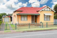 36 Boomerang Street Cessnock NSW 2325 $300,000 - $320,000 LOADS OF POTENTIAL IN THIS LOCATION! – Minutes walk to the CDB – Stylish weatherboard cottage with solid bones for a renovation – Three double bedrooms, huge wardrobes that are staying – Spacious air-conditioned living area – Tidy kitchen & bathroom, ideal start for a first home buyer or investor to lease the property out as is – Front and back sheltered porch – Garage and carport, easily removed if you want to build a new one – Level yardspace – NB sold on a walk in walk out basis so if you are looking for a furnished property to start your journey this is the one! – Very central location surrounded by some of Cessnocks finest period homes, easy stroll to the CBD, don’t miss this one.
