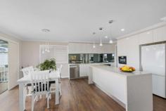 20 Brooks Terrace Kanahooka NSW 2530 $810,000 - $860,000 Situated in a great part of Kanahooka is this large family home. Featuring 4 generous bedrooms, main bedroom with ensuite & WIR, a designer kitchen with quality appliances and island bench, spacious open plan living and dining area which flows out to the entertaining deck which takes in views towards the lake . Downstairs you are welcomed by the second living space, main bathroom and you venture outside to another alfresco entertaining area overlooking the large child friendly yard. Located just moments to the lake foreshore , walking tracks, shops, schools and transport this home is sure to impress the growing family. FEATURES: Air Conditioning Built-In Wardrobes Close To Schools Close To Shops Close To Transport Garden.