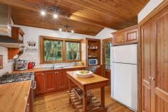 117 Evans Lookout Rd, Blackheath NSW 2785 $895,000 On a 1063m2 block and only 3km from Blackheath Village, this home has a lot to offer. Featuring a 6 person outdoor spa, cosy timber panelling, charming leafy views throughout, a self-contained studio with garage, wood fire, and large bedrooms with plenty of storage, this property is both spacious and versatile, making it a very appealing option to a broad market. Whether you're looking for a large family home, room for entertaining guests, investment potential, or space to work from home, this property has you sorted. Hamptons style home with timber panelling throughout 5 spacious bedrooms with storage Cosy lounge room with combustion wood fire, and other heating options throughout Leafy views throughout, with bush-inspired garden offering plenty of entertaining space 3km from Blackheath Village Plenty of communal living space Country-style kitchen with charming timber benchtops Sitting on a 1063m2 block 4 bathrooms Character-filled raked ceilings Separate self-contained studio or parents' retreat with garage