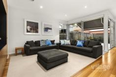 8 OBERON WAY NEWPORT VIC 3015 $1,400,000 - $1,450,000 Certain to take your breath away, this contemporary yet timeless, 3 bedroom residence has been architect-designed for a lofty, light-loving, sense of spaciousness unlike most others. A brilliant use of windows, natural light and towering ceilings creates a visual impact that will always endure. _The kitchen is central to open-plan meals / living with broad corian benches, a breakfast bar and a Gaggenau stainless steel oven / cooktop. _A divine flow through two sets of glass sliding doors to a north-facing courtyard with a retractable awning is perfectly suited to al fresco entertaining. _Combining towering ceilings with the remarkable ambiance of a Heat’n’Glo gas log fire, the sunken lounge room is stunning. _The master bedroom is a vast indulgence with a designer ensuite and wonderful walk-in robes. _Also vogue, the bathroom is family-sized with independent bath and a frameless-screened shower. _The remaining two bedrooms are well-appointed with large built-in robes. _Double garage with polished concrete floors. _Ducted gas heating and refrigerated air conditioning. _Also features polished timber floors, ducted vacuum and an alarm. _Quiet setting near cafes, shops and schools. _Walk to parkland and the waterfront. _Easy city access by train in under 15 minutes.