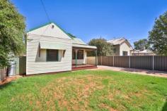 6 Pearl Avenue Mildura VIC 3500 $174,000 - $191,000 Updated, spacious and located close to town, this charming weatherboard home ticks all the boxes. With a fully-fenced yard and a 453sqm block, a growing family could comfortably live here, along with first home buyers, downsizers and those who need room for their business. Inside, there are four bedrooms, each with a built-in robe, plus a modern bathroom with stylish tiles, a bath and storage. The kitchen has also been updated and offers a walk-in pantry, gas cooking, plenty of storage and a dishwasher. The kitchen is open to the casual living space where reverse cycle air-conditioning provides complete comfort year-round. Step outside to the low-maintenance yard with a good-sized shed for extra storage. A front porch offers a peaceful space to relax with your morning coffee and there is a grassed yard for the family pet. You will love the quiet location of this charming home with the CBD only moments from your front door. Rental appraisal of $300 per week.