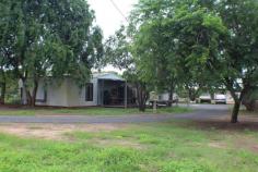 1055 Livingstone Road Berry Springs NT 0838 $545,000 Love to cook and entertain well this country chic kitchen is for you with tons of storage space! If it is lots of space that you need then look no further this property has 28+ acres and is within a short drive to the to a local primary school, sporting ovals, shopping centre with GP clinic, and the Berry Springs Tavern plus it is only 15 minutes from Palmerston CBD. The accommodation is shaded by tall leafy trees and as you walk inside it is has calming glow to it. Country charm with tiled flooring underfoot, a country chic kitchen and large window that frame the mango farm outside and you can also enter via the mud room. Property features. - Ground level with 3 rooms - Large open-plan living and dining rooms - Spacious rooms, all with tiled flooring - Relaxing rainwater pool to cool off in after a long day - Rural oasis, minutes to major amenities - 6 x 6 carport parking for 2 - Cattle holding pen - 10lps Bore - Potential income producing Mango's - 2 Containers for workshop and storage plus cool room.