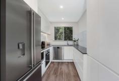 3/300B Burns Bay Road Lane Cove NSW 2066 $700,000 Set in the sought-after 'Parkway' complex, this sizeable two-bedroom apartment delivers a lifestyle of unrivalled luxury. Recently renovated to showcase a seamless in/outdoor flow with open living and high-calibre European appointments, it embraces leafy water views from its private balcony. The ultra-convenient setting is mere footsteps to the waterside of Burns Bay, bus services and just moments to Lane Cove's vibrant shopping precinct. Open plan living/dining with full-length sliding glass doors Galley-style kitchen with stainless steel appliances, pantry, stone benchtops, high-gloss polyurethane cabinetry Sweeping full-length balcony with alfresco dining area Built-in robes and plush carpet in both bedrooms Luxury floor-to-ceiling tiled bathroom with stone vanity, frameless rain shower and separate bath Stylish timber floors in the living areas, internal laundry Ducted reverse cycle air conditioning, intercom entry Security parking plus storage cage Steps from city and Chatswood buses, walk to Fig Tree village shops, moments to Hunters Hill and Lane Cove Village.