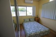 5 Clement St Ayr QLD 4807 $249,000 Tucked away neatly in a quiet part on Rossiter's Hill is this "PICTURE PERFECT" 3 bedroom low set family home on a 809m2 town block. Stunning lush gardens invite you further to investigate what lies within. Combined airconditioned living & dining with gleaming timber floors upon entry from the tiled front patio. Tidy kitchen with ample bench, prep & storage space. Down the hallway you will come upon this homes bathroom amenitites which are conveniently located near the 3 bedrooms sporting timber floors, airconditioning, fans & 2 with built-ins. Internal laundry with storage & a handy 2nd toilet. Venture outside into the stunning gardens which have sprinklers & irrigation in place. Carport parking for one on the left & double parking through the auto rollerdoor on the right with drive through access to the block "MANCAVE" outback which is powered with loads of room for hubby's extra's...An abundance of exotic fruit trees including citrus, mulberry, custard apple, mangosteen & more. Dot the backyard with lush grass & foliage to create the most peaceful setting. This family home is a great place to start so arrange your immediate inspection today. You won't want to miss out.
