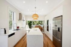 79 Clovelly Road Randwick NSW 2031 $2.5m Newly Renovated Family Home On 335sqm, A Perfect Fusion Of Form, Function And Flair Contemporary design and family functionality unite in this wide-fronted Federation semi to deliver a perfect environment for relaxed living and entertaining on the border of Randwick and Clovelly. Freestanding to the north, the newly renovated five-bedroom home's stylish interiors embrace the outdoors with bright open living space extending to an all-weather entertainer's terrace and deep leafy garden. A considered design and well conceived layout offers plentiful room for the growing family with loads of storage space and a master suite overlooking the gardens. Just 100m to Frenchmans Road's village cafes and eateries, this beautifully presented home is ideal for lovers of the great outdoors within easy walking distance of Queens and Centennial Parks and minutes to Bronte and Clovelly Beaches. * 6m frontage with hardstand parking * 5 double bedrooms with built-in robes * Master with a stylish designer ensuite * Carrara marble fish scale mosaic finishes * Fluid open plan living and entertaining * Windows on the north, loads of sunlight * Grey Ironbark floors and pendant lighting * Chef's grade Caesarstone gas kitchen * 3m breakfast island, NEFF appliances * Dining with bi-folds to a covered terrace * Leafy established garden with sunny lawn * 3 designer bathrooms, main with a bath * Grohe tapware and dual shower heads * 3rd bath with custom-fitted family laundry * Pure NZ wool carpeting on the upper level * Plantation shutters and ceiling fans * Basement level storeroom with extra W.C. * Sandstone walled cellar, ideal wine cellar * Attic storage plus ample built-in storage .